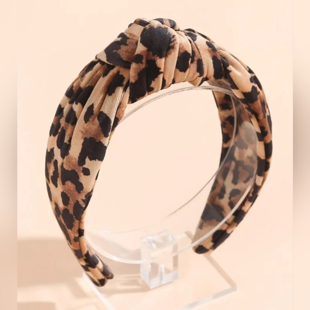 Women's headband with leopard print knot design